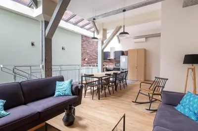 Coin salon dans l'établissement Lofts Philippe-Auguste