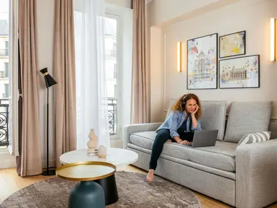 Coin salon dans l'établissement Aparthotel Adagio Paris Opéra