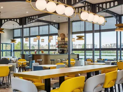 Restaurant ou autre lieu de restauration dans l'établissement ibis Paris Porte de Montreuil
