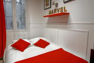 Un ou plusieurs lits dans un hébergement de l'établissement 25 - Fun Duplex in Montorgueil