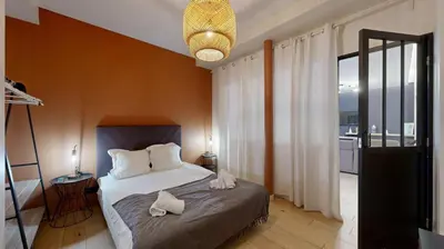 Un ou plusieurs lits dans un hébergement de l'établissement 140 Suite Ludo - Superbe Appartement à Paris