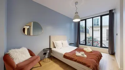Un ou plusieurs lits dans un hébergement de l'établissement 140 Suite Ludo - Superbe Appartement à Paris