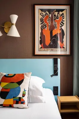 Un ou plusieurs lits dans un hébergement de l'établissement Hôtel Artus