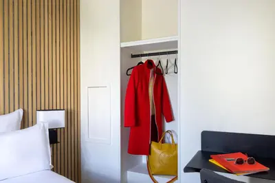 Un ou plusieurs lits dans un hébergement de l'établissement Hotel Korner Montparnasse