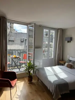 Un ou plusieurs lits dans un hébergement de l'établissement Quartierlatin apartment