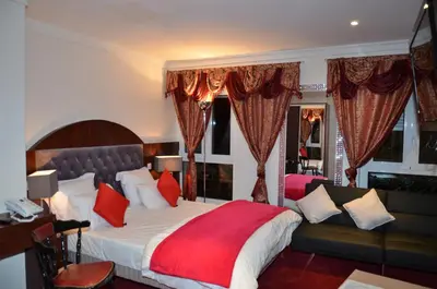 Un ou plusieurs lits dans un hébergement de l'établissement Hotel Regina Montmartre