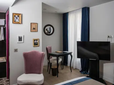 Télévision ou salle de divertissement dans l'établissement Hotel Taylor