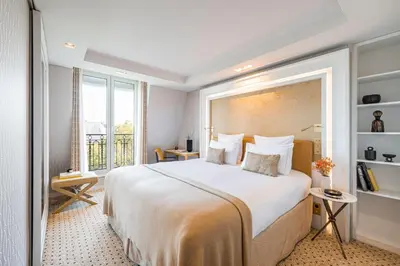 Un ou plusieurs lits dans un hébergement de l'établissement Hôtel Madison