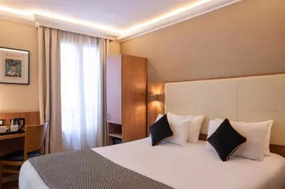 Un ou plusieurs lits dans un hébergement de l'établissement Hotel Cactus