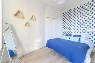 Un ou plusieurs lits dans un hébergement de l'établissement Daumier - New 2 Bdrs Flat near la Seine