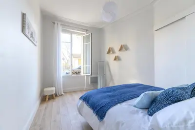 Un ou plusieurs lits dans un hébergement de l'établissement Daumier - New 2 Bdrs Flat near la Seine