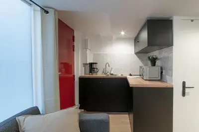Cuisine ou kitchenette dans l'établissement Architect's Duplex - Haut Marais