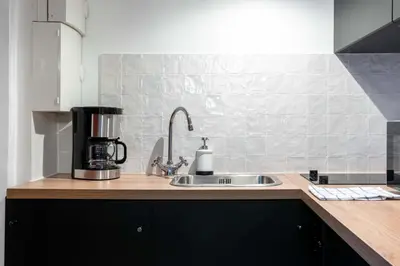 Cuisine ou kitchenette dans l'établissement Architect's Duplex - Haut Marais