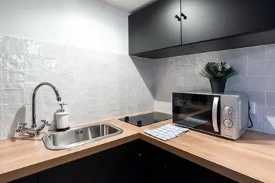 Cuisine ou kitchenette dans l'établissement Architect's Duplex - Haut Marais