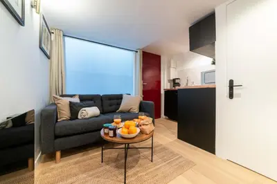 Coin salon dans l'établissement Architect's Duplex - Haut Marais