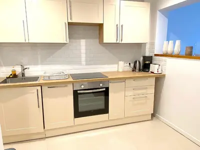 Cuisine ou kitchenette dans l'établissement L'appartement Saint-Germain