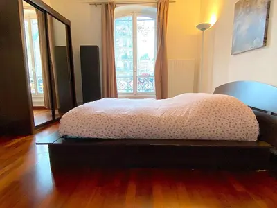 Un ou plusieurs lits dans un hébergement de l'établissement L'appartement Saint-Germain