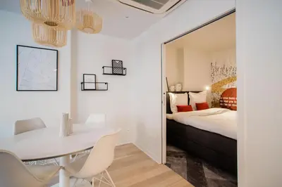 Un ou plusieurs lits dans un hébergement de l'établissement SUITE GIDE : au cœur de la Rive Gauche, neuf, design, 2/4 personnes