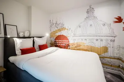 Un ou plusieurs lits dans un hébergement de l'établissement SUITE GIDE : au cœur de la Rive Gauche, neuf, design, 2/4 personnes