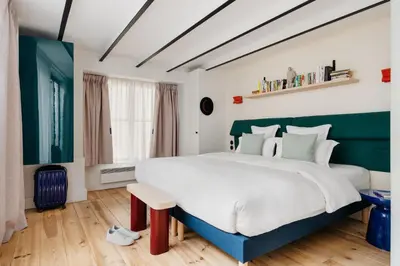 Un ou plusieurs lits dans un hébergement de l'établissement Edgar Suites Marais - Nazareth