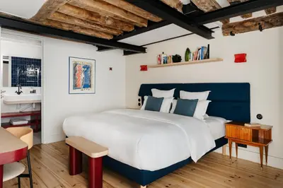 Un ou plusieurs lits dans un hébergement de l'établissement Edgar Suites Marais - Nazareth