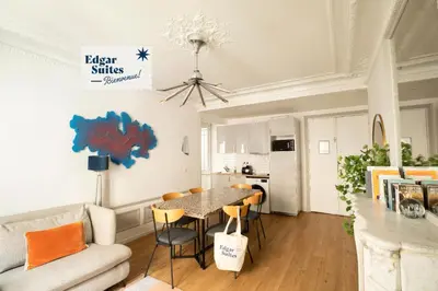 Télévision ou salle de divertissement dans l'établissement Edgar Suites Martyrs - Lebas