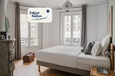 Un ou plusieurs lits dans un hébergement de l'établissement Edgar Suites Martyrs - Lebas
