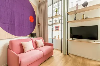 Télévision ou salle de divertissement dans l'établissement Appartement Panthéon - Feuillantines