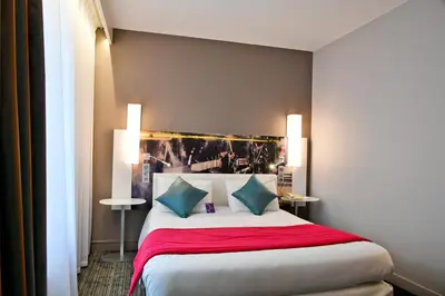 Un ou plusieurs lits dans un hébergement de l'établissement East Side House Paris, a member of Radisson Individuals