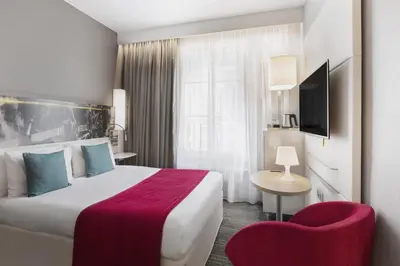 Un ou plusieurs lits dans un hébergement de l'établissement East Side House Paris, a member of Radisson Individuals