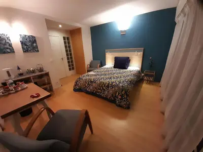 Coin salon dans l'établissement Homestay Rooms Paris Porte de Versailles