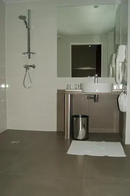Salle de bains dans l'établissement Hotel d'Amiens