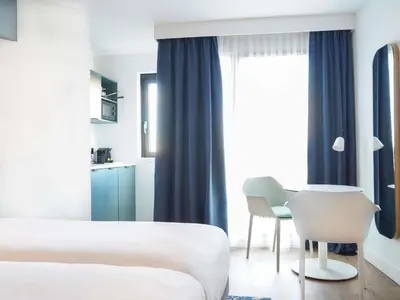 Cuisine ou kitchenette dans l'établissement AppartHotel Mercure Paris Boulogne