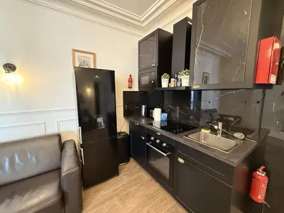 Cuisine ou kitchenette dans l'établissement 107 - Urban Luxury Opera Vinci