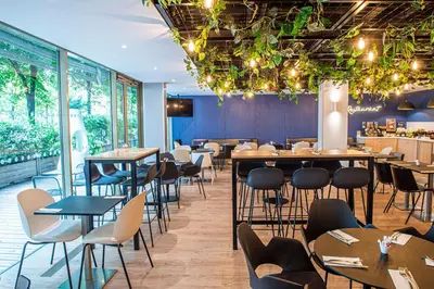 Restaurant ou autre lieu de restauration dans l'établissement Holiday Inn Express Paris-Canal De La Villette by IHG
