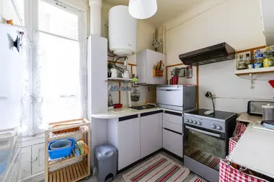 Cuisine ou kitchenette dans l'établissement GuestReady - Bel Apt à 5 minutes de Chinatown