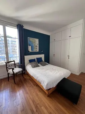 Un ou plusieurs lits dans un hébergement de l'établissement GuestReady - Amazing 2BR Flat near Passy Village