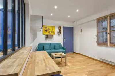 Coin salon dans l'établissement GuestReady-Charming Studio 15 mins to Grand Palais