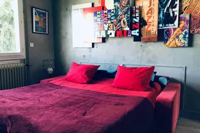 Un ou plusieurs lits dans un hébergement de l'établissement JAZZAPPART appartement classé 3 étoiles