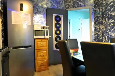 Cuisine ou kitchenette dans l'établissement JAZZAPPART appartement classé 3 étoiles