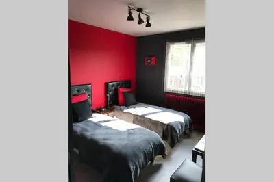 Un ou plusieurs lits dans un hébergement de l'établissement JAZZAPPART appartement classé 3 étoiles