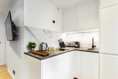 Cuisine ou kitchenette dans l'établissement CMG Résidence Canal Saint-Martin Vellefaux