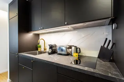 Cuisine ou kitchenette dans l'établissement CMG Résidence Canal Saint-Martin Vellefaux