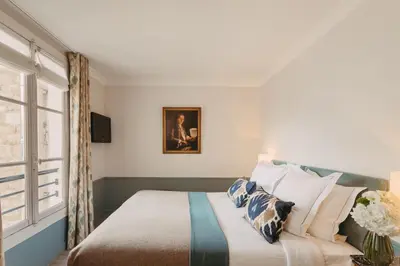 Un ou plusieurs lits dans un hébergement de l'établissement Hôtel d'Orsay - Esprit de France