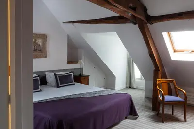Un ou plusieurs lits dans un hébergement de l'établissement Hôtel d'Orsay - Esprit de France