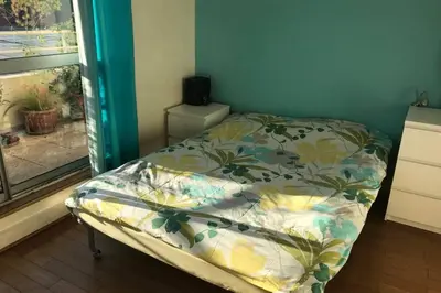 Un ou plusieurs lits dans un hébergement de l'établissement Bel appartement lumineux / Happy rooftop 120 m2