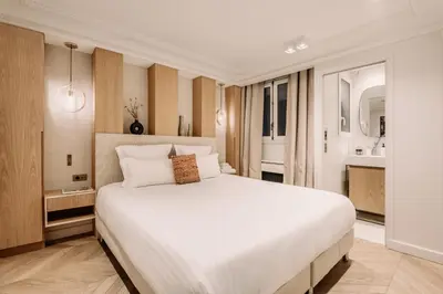 Un ou plusieurs lits dans un hébergement de l'établissement HIGHSTAY - Luxury Serviced Apartments - Louvre-Rivoli