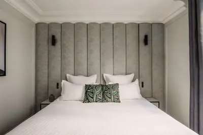 Un ou plusieurs lits dans un hébergement de l'établissement HIGHSTAY - Luxury Serviced Apartments - Louvre-Rivoli