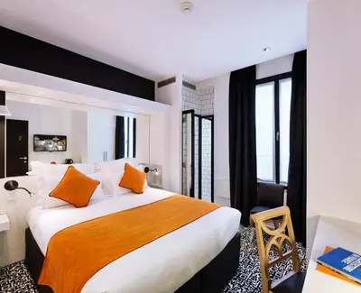 Un ou plusieurs lits dans un hébergement de l'établissement Best Western Premier Faubourg 88