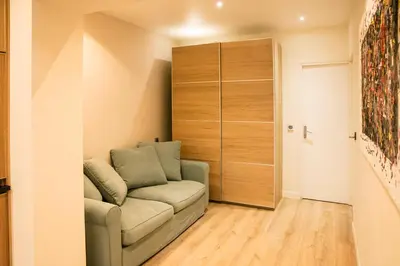 Coin salon dans l'établissement Apart 2 Opera New 2-3 Rooms for 4 guests